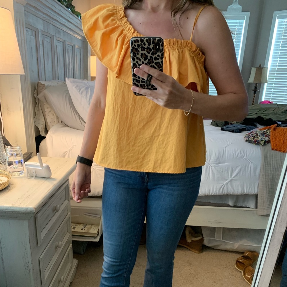 Hers and mine brand Ruffled top from a local boutique true to size